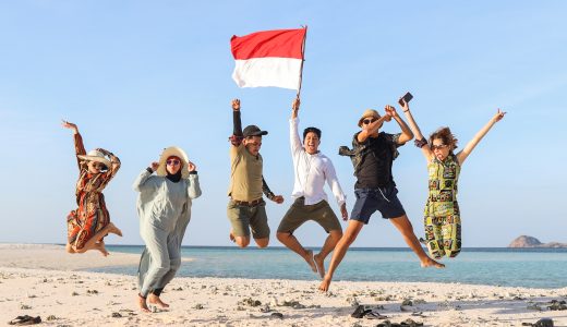 Group of people jumping together on the beach for celebrating Indonesia Independence day Group of people jumping together on the beach for celebrating Indonesia Independence day